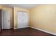 Bedroom with hardwood flooring and double door closet providing ample storage space at 1930 Silver Crest Ct, North Las Vegas, NV 89031