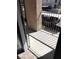 Private balcony overlooking a well-maintained community area with ample parking spaces available at 2110 Los Feliz St # 2037, Las Vegas, NV 89156