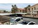 Exterior view of the property showcasing multiple carports and condo buildings at 2110 Los Feliz St # 2037, Las Vegas, NV 89156