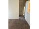 View of a carpeted hallway leading to the bathroom at 2110 Los Feliz St # 2037, Las Vegas, NV 89156