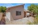 Cozy backyard featuring low-maintenance landscaping and stucco walls for privacy at 2137 Hidden Ranch Ter, Henderson, NV 89052