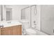 Bathroom features a vanity, toilet, and a shower/tub combo with glass doors at 2137 Hidden Ranch Ter, Henderson, NV 89052