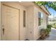 Home featuring a front door with sidelight window and neutral-toned stucco exterior at 2137 Hidden Ranch Ter, Henderson, NV 89052