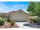 Beautiful single-story home boasts a well-kept yard and an attached two-car garage at 2137 Hidden Ranch Ter, Henderson, NV 89052