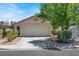 Charming one-story home with a desert landscape and covered front entrance at 2137 Hidden Ranch Ter, Henderson, NV 89052