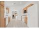 Bright kitchen with stainless appliances, wood cabinets, tile flooring, and natural light at 2137 Hidden Ranch Ter, Henderson, NV 89052