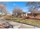 Community park with a lush green lawn, mature trees, a gazebo, and a walking path at 2137 Hidden Ranch Ter, Henderson, NV 89052