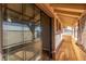 View of an outdoor balcony space with an open sliding glass door that leads into the home's interior at 2232 Valley Dr, Las Vegas, NV 89108