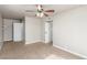 Bedroom with carpet flooring, ceiling fan, and closet at 2232 Valley Dr, Las Vegas, NV 89108