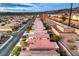 Stunning aerial view showcasing an extensive residential community with desert landscaping at 2475 Hamonah Dr, Henderson, NV 89044