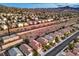 Expansive aerial view of a meticulously planned community with stunning mountain backdrop at 2475 Hamonah Dr, Henderson, NV 89044