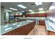 Well-equipped catering kitchen featuring stainless steel appliances, ample counter space, and plenty of cabinet storage at 2475 Hamonah Dr, Henderson, NV 89044