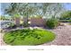 Solera community entrance sign with a manicured turf area and desert landscaping at 2475 Hamonah Dr, Henderson, NV 89044