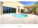 Outdoor spa with chairs and lounge area at 2475 Hamonah Dr, Henderson, NV 89044