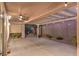 Spacious covered patio features a ceiling fan and ample room for outdoor seating, perfect for entertaining at 2475 Hamonah Dr, Henderson, NV 89044