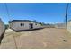 Backyard featuring exterior of home and view of lot perimeter at 2512 Taylor Ave, North Las Vegas, NV 89030