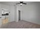Bright bedroom with soft carpet and ensuite bathroom at 2512 Taylor Ave, North Las Vegas, NV 89030