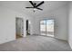 Cozy bedroom with sliding glass door access to the yard and ensuite bathroom at 2512 Taylor Ave, North Las Vegas, NV 89030