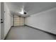 Garage featuring a large garage door and concrete floor at 2512 Taylor Ave, North Las Vegas, NV 89030