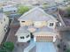 Aerial view of a well-maintained two-story home with a tile roof and desert landscaping at 2681 Benton Cove St, Laughlin, NV 89029