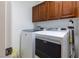 Laundry room features a modern washer and dryer for convenient home care at 2681 Benton Cove St, Laughlin, NV 89029