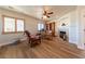 Bright office with a fireplace, wood floors, and comfortable seating area at 2681 Benton Cove St, Laughlin, NV 89029