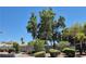 Well-maintained apartment complex with lush landscaping and mature trees at 2899 Bluebonnet Dr # 2899, Henderson, NV 89074