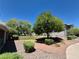 Apartment complex offers well-manicured landscaping and mature shade trees at 2899 Bluebonnet Dr # 2899, Henderson, NV 89074