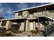 Apartment building with a balcony and outdoor stairs at 2899 Bluebonnet Dr # 2899, Henderson, NV 89074