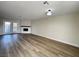 Spacious living room with wood flooring and a fireplace at 2899 Bluebonnet Dr # 2899, Henderson, NV 89074