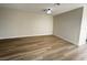 Open-concept living space with new flooring and neutral walls at 2899 Bluebonnet Dr # 2899, Henderson, NV 89074