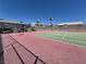 Outdoor tennis court with basketball hoop near well-maintained apartment complex at 2899 Bluebonnet Dr # 2899, Henderson, NV 89074