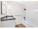 Modern bathroom with a tub, tiled shower, and sleek vanity at 304 Orland St # 43, Las Vegas, NV 89107