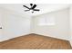 Bright bedroom featuring wood floors, a modern ceiling fan, and a large closet at 304 Orland St # 43, Las Vegas, NV 89107
