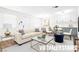 Bright living room featuring a stylish sofa, glass coffee table, and modern decor at 304 Orland St # 43, Las Vegas, NV 89107