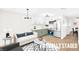 Cozy living room and kitchen area with modern finishes and ample natural light at 304 Orland St # 43, Las Vegas, NV 89107