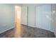 A bedroom with a door to the bathroom and mirrored closet doors at 3236 Idaho Springs St, North Las Vegas, NV 89032