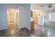 Bright kitchen area with wood cabinets, granite countertops, and a full appliance suite at 3236 Idaho Springs St, North Las Vegas, NV 89032