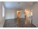 Open-concept living area with large windows and a view into the kitchen at 3236 Idaho Springs St, North Las Vegas, NV 89032