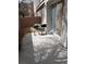 A concrete backyard with two grills and a sliding glass door at 3681 Hidden Beach Ct, Las Vegas, NV 89115