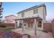 A backyard featuring a covered patio and partial lawn provides the ultimate outdoor space at 3725 Shanagolden St, Las Vegas, NV 89129