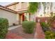 Charming home exterior showcasing well-maintained landscaping and a brick walkway to the front door at 3725 Shanagolden St, Las Vegas, NV 89129