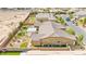 Overhead view of desert landscaped backyard with artificial turf at 3914 Jacob Lake Cir, Las Vegas, NV 89118