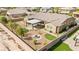 Expansive backyard featuring a covered patio, low-maintenance landscaping, and a cozy fire pit area at 3914 Jacob Lake Cir, Las Vegas, NV 89118