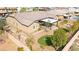 A well-maintained backyard featuring desert landscaping, a covered patio, and space for outdoor entertaining at 3914 Jacob Lake Cir, Las Vegas, NV 89118