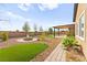 Spacious backyard with a cozy firepit at 3914 Jacob Lake Cir, Las Vegas, NV 89118