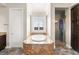 Bathroom features a soaking tub with granite surround and a large walk-in shower at 3914 Jacob Lake Cir, Las Vegas, NV 89118