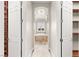 Bright bathroom features a luxurious soaking tub with views and dual walk-in closets at 3914 Jacob Lake Cir, Las Vegas, NV 89118