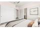 Bedroom features neutral walls, a ceiling fan and generous closet space at 3914 Jacob Lake Cir, Las Vegas, NV 89118