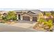 Attractive single-Gathering home with desert landscaping and brick paved driveway at 3914 Jacob Lake Cir, Las Vegas, NV 89118